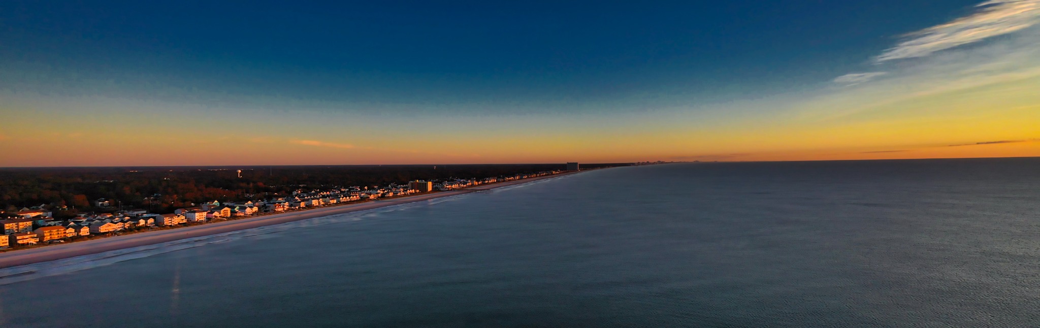 Panoramic sunset over the coast